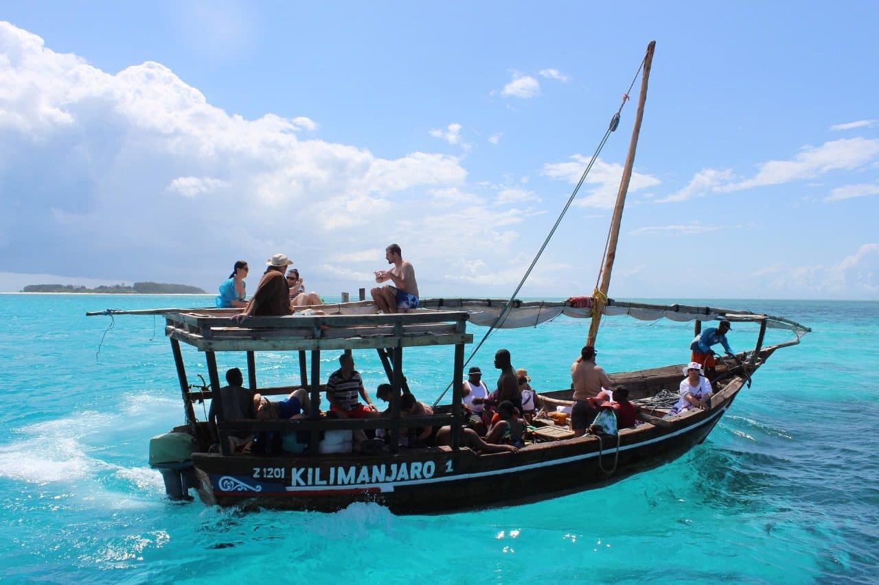 Traditional dhow on turquoise water off the Mozambique coast