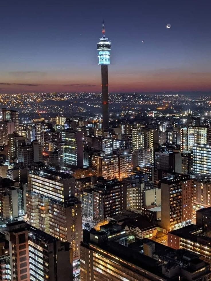Johannesburg skyline at dusk with the Hillbrow Tower lit up